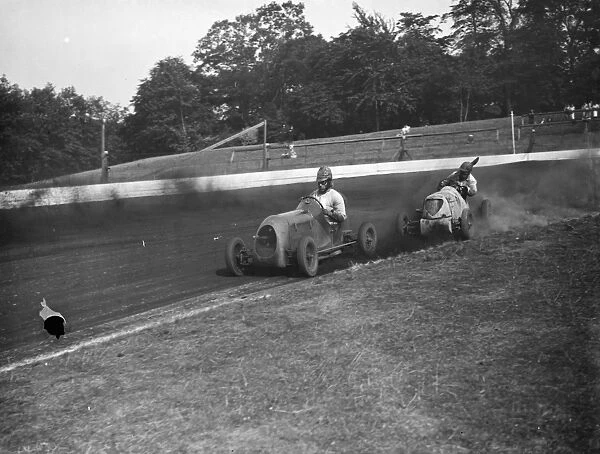 The Crystal Palace miniature car racing grand prix. The cars take the bend. 1938