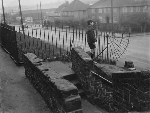 A dangerous footway in Crayford, Kent. 1936