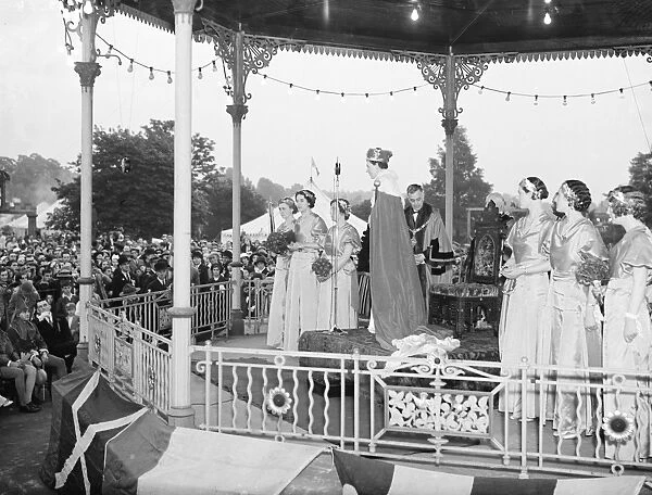 The Dartford Carnival. The queen waves from the bandstand. 1936