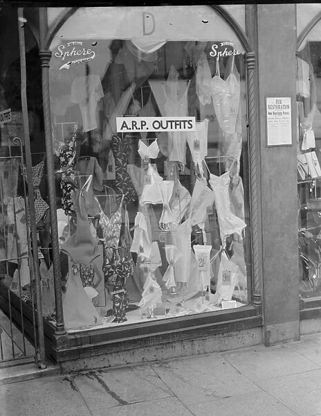 A Dawsons shop front advertising that they have Air Raid Precautions ( ARP ) outfits