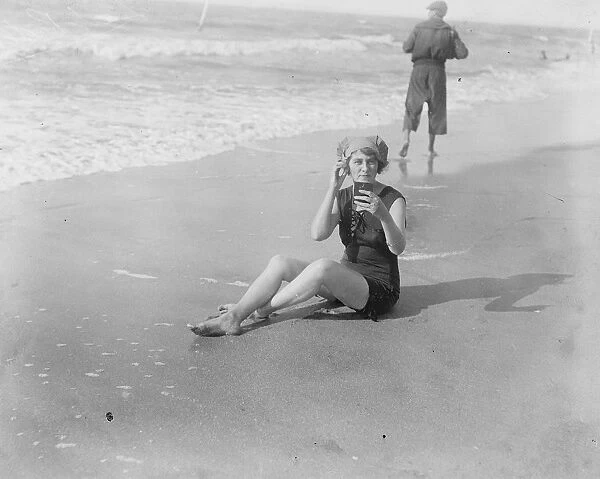 The Deauville Season. Lady Pedler completing her seaside toilet at Deauville 10