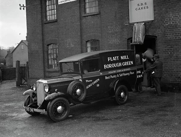 A delivery van from Platt Mill, Borough Green, Kent is loaded up with sacks of flour
