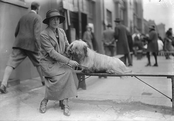Dog show at Holland Park. Lady Marcia Miles with her Skye Terrier. 16 April 1925