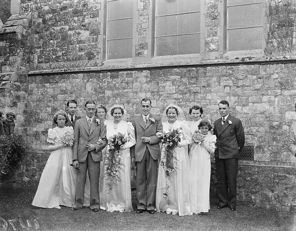The double wedding of the Wood sisters in Mottingham, Kent. Miss Molly Kathleen