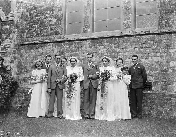The double wedding of the Wood sisters in Mottingham, Kent. Miss Molly Kathleen
