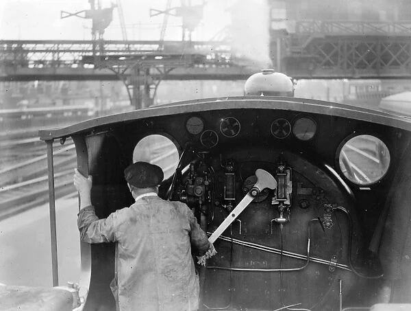 The driving cab of a typical Southern Railway Engine at Waterloo Station. 2 July 1923