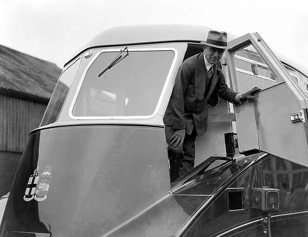 Earl Howe in the driving cab of the New Great Western Railway Steam Lined Railcar