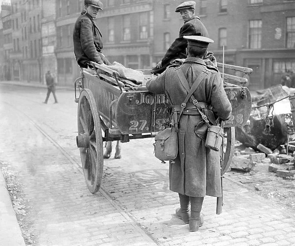 Easter Rising (originally captioned The Dublin rebellion) A sentry searching