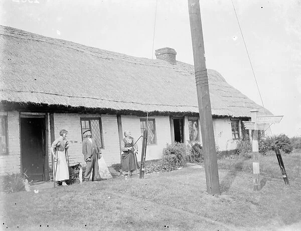 The elderly inhabitants of the thatched cottages in Bredgar, Kent. 1935