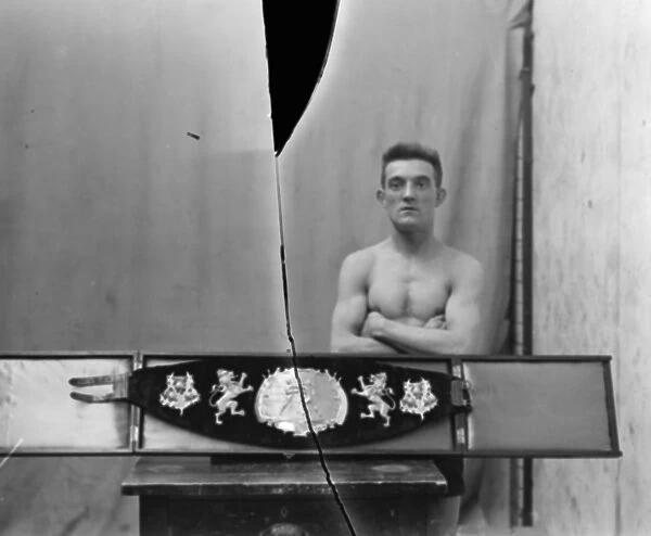 Elky Clark, posed with belt 1924