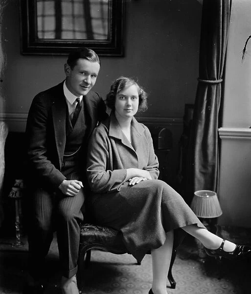 The engagement of Mr Basil Hill Wood and the Hon JOan Brand AN engagement is announced