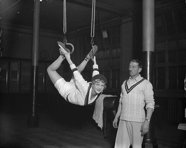 Englands popular young film star at the Mayfair Gymnasium. Miss Flora le Breton
