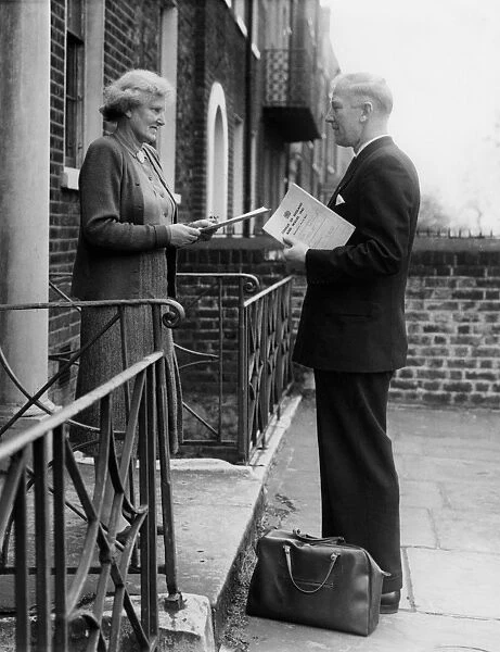 An enumerator seen collecting Census papers when on his rounds in Kennington, London