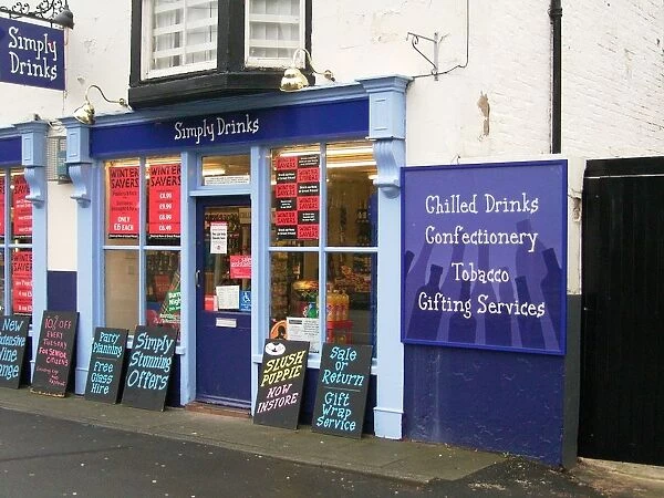 Eye-catching off-licence called Simply Drinks with blackboards and posters advertising