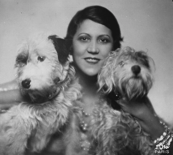 Famous actress with her canine pets. Mlle Jane Marna. 30 January 1929