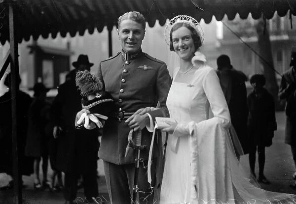 Famous flying officer weds. H F G Southey and Miss Joan Davies at St Pauls Knightsbridge