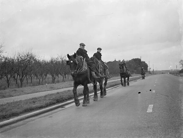 Farm workers on horseback, homeward bound in Farrningham, Kent. 1938