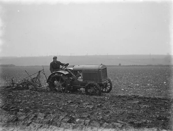 A farmer on a tractor ploughing a field near Swanley, Kent. 1936