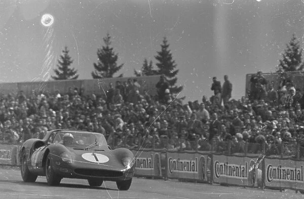 The Ferrari of John Surtees and Ludovico Scarfiotti pictured in their Ferrari during