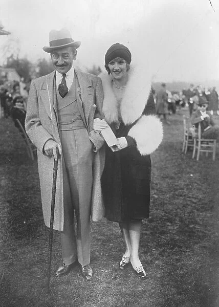 Film stars engagement. Adolphe Menjou the film star, with Miss Katherine Carver