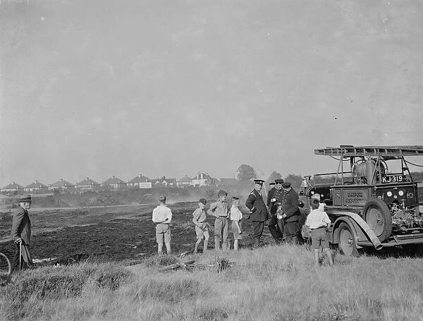 Fire Brigade put out a fire on Dartford Heath. 6 September 1937