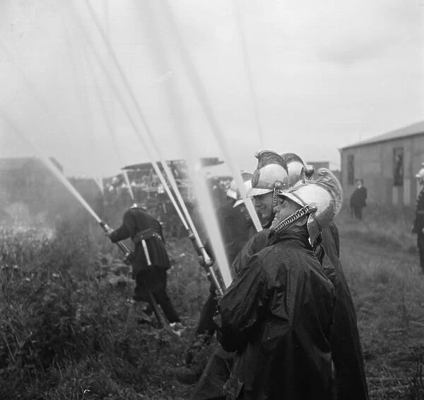 Firemen give demonstration at the fire brigade display in Dartford, Kent