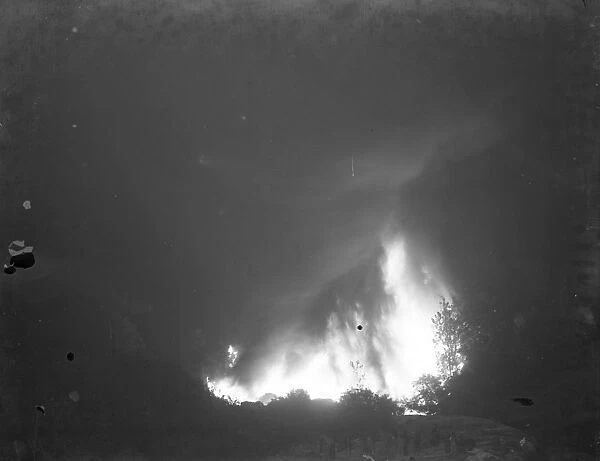 Flames and smoke from the fire at the tire dump in Ruxley, Kent. 2 June 1937