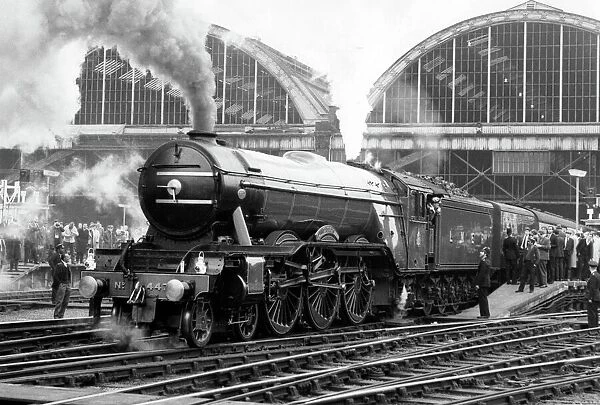 The Flying Scotsman pulls out of Londons Kings Cross station to make the last