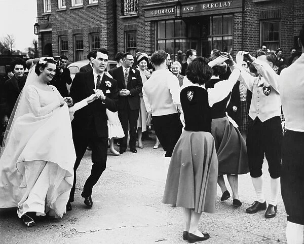 Folk Dancing At Their Wedding. When Miss Margaret Morris (21) married Mr. Keith Uttley at St
