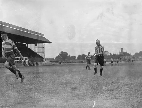 Footballers at Dartford. Players moving for the ball. 1936