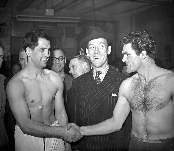Freddie Mills Britain and European light-heavyweight Champion, and Paco Bueno (the kid from Spain)