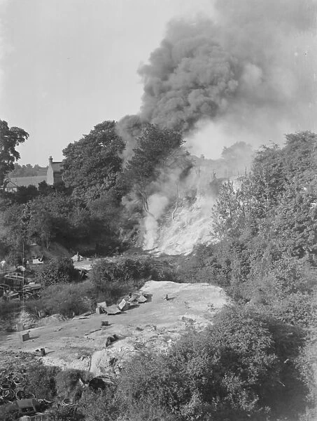 A fresh breakout of fire at the tire dump in Ruxley, Kent. 2 June 1937