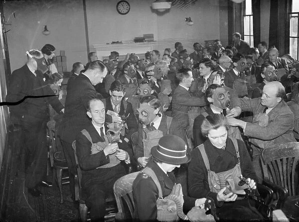 Gas mask instruction at the council offices in Orpington, Kent. January 1938