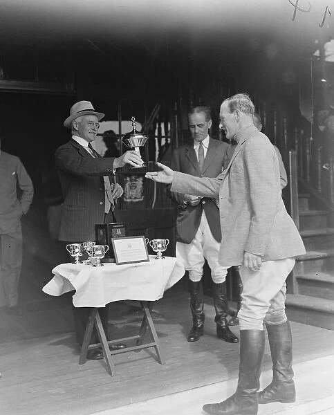 General Sir Beauvoir De Lisle presenting the Subalterns Gold Challenge Cup to Mr R A G Bingley