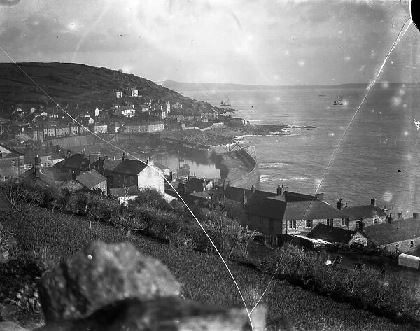General view of the town and harbour at Mousehole, Cornwall. 1929