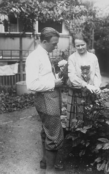 German airman to attempt Atlantic flight. Risticz with his wife in their garden at Dessau