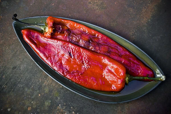 Grilled red peppers with blistered skins removed credit: Marie-Louise Avery  /  thePictureKitchen