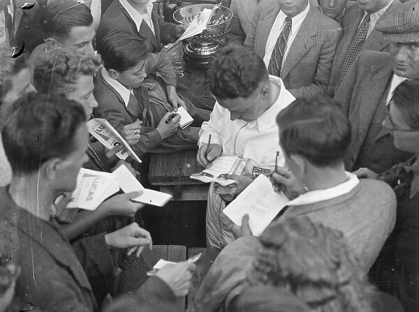 H L Hadley signing autographs after winning the Imperial Trophy at Crystal Palace Racing