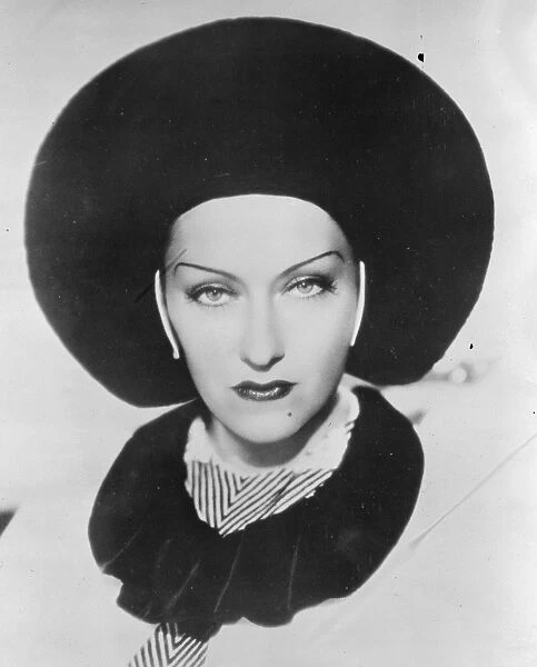 The Halo hat worn by Gloria Swanson, the American filmstar. 20 October 1934