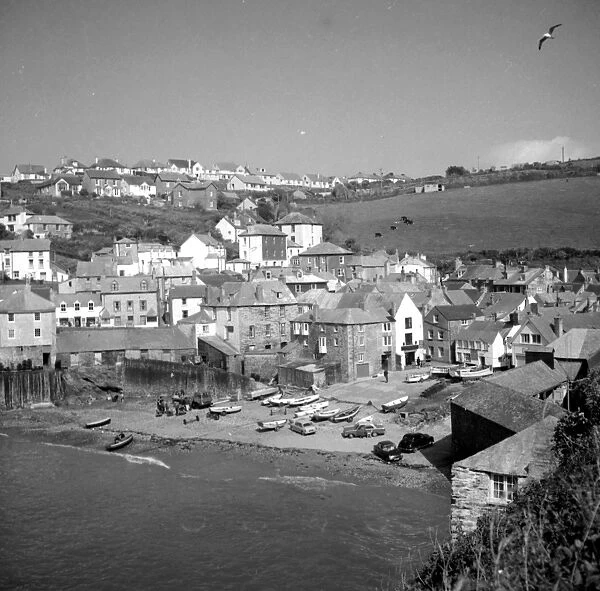 Harbour with boats at Port Isaacs, Cornwall, England, UK 1960s Fish where the fish are
