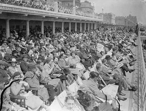 Holiday Crowds Find the Sun at Eastbourne Although London shivered in cold wind