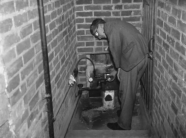 Hop Kilns the oil heater in Goudhurst. 1937