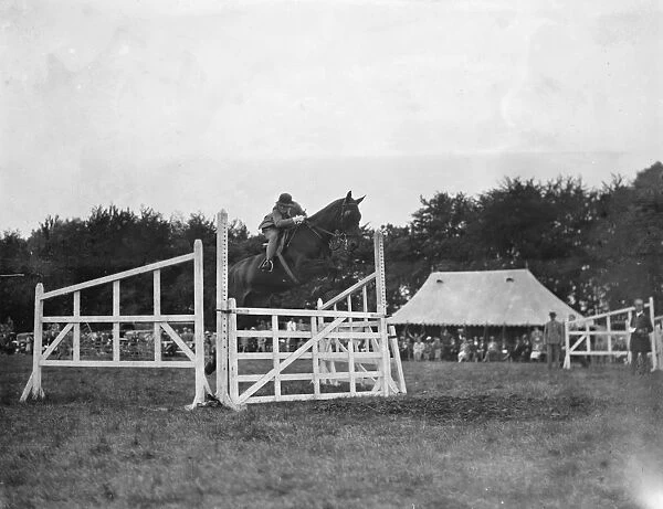 A horse show in Westerham, Kent. The show jumping competition. 1936