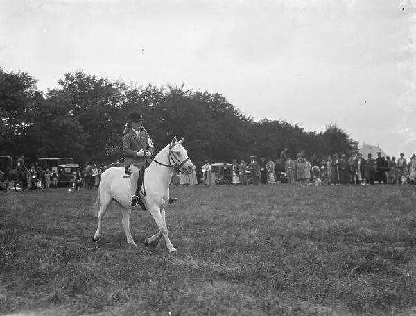 A horse show in Westerham, Kent. Young riding a pony. 1936