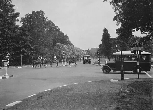 Horses and traffic lights at a road junction. 1937
