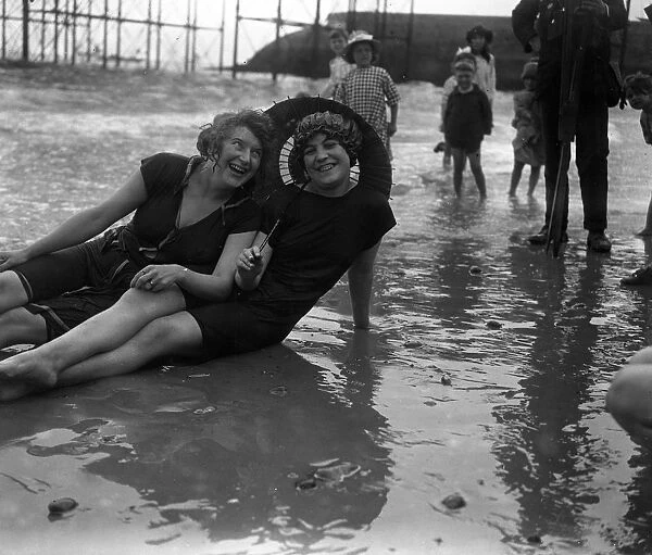 Hot weather scenes on the beach at Brighton, Sussex. 16 June 1921