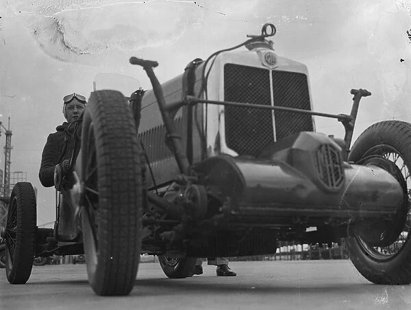 Husband and wife practice at Brooklands for Easter racing. Mrs Roy Eccles was among
