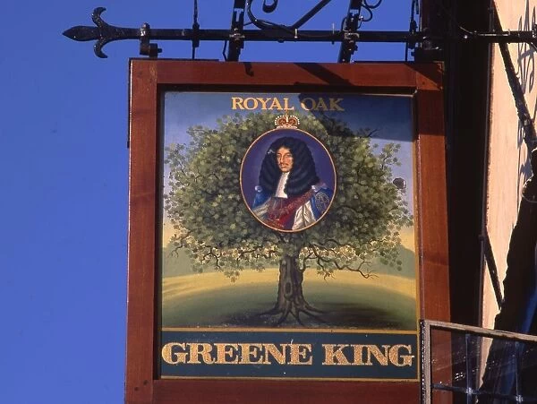 Inn sign of The Royal Oak. Pub sign for one of the Greene King houses