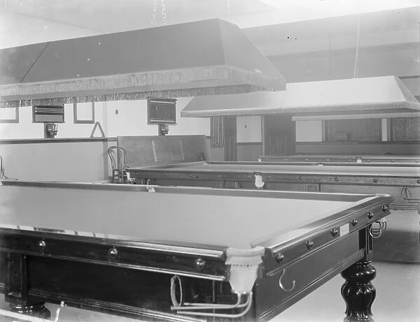 An interior view of the Crayford Social Club in Crayford, Kent. The snooker tables