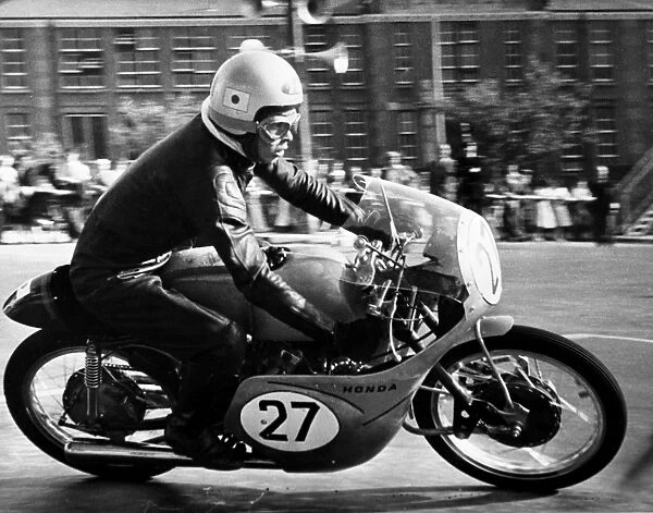 Isle of Man: One of the Japanese team members T Tanaka speeds round thes maller Clypse